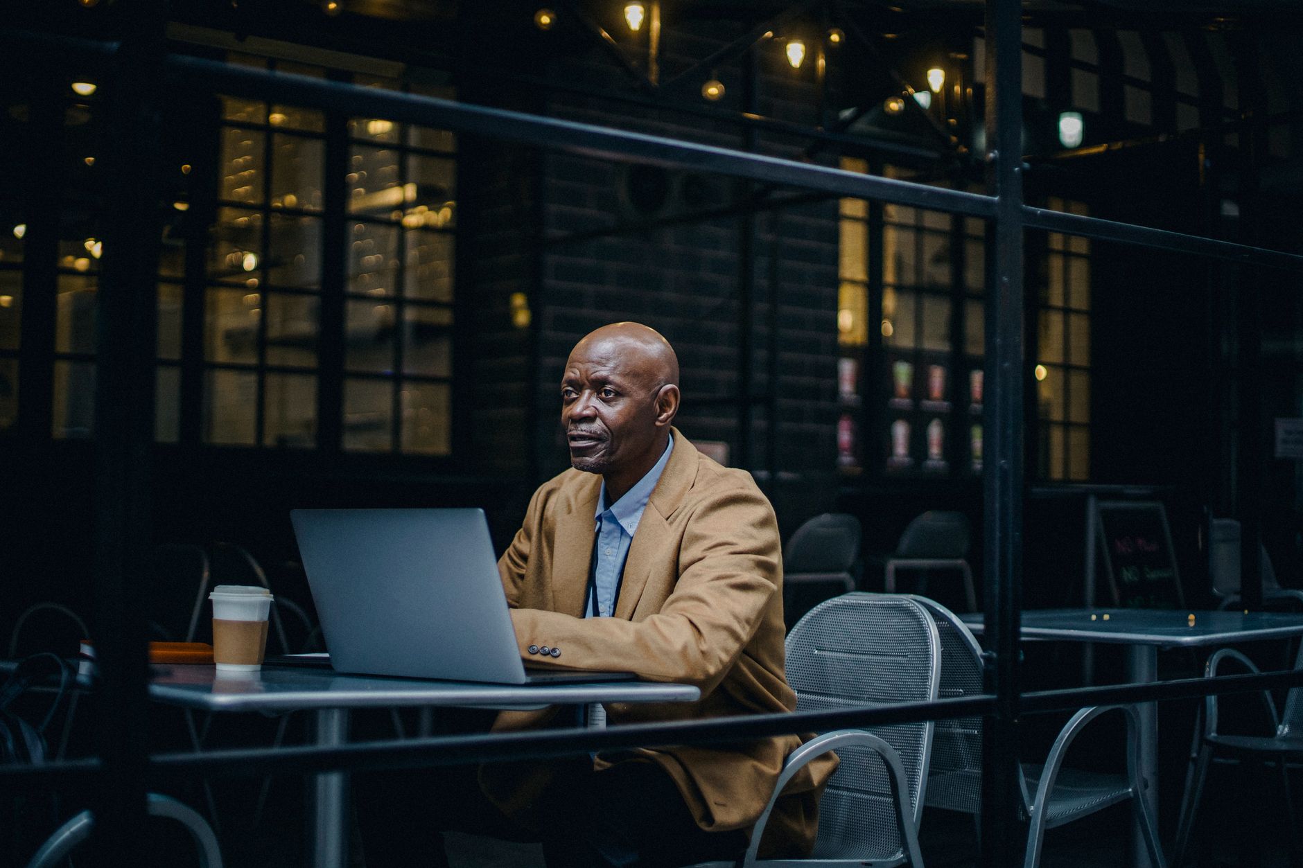 Remote worker in independent café, part of the London to smaller cities migration shift