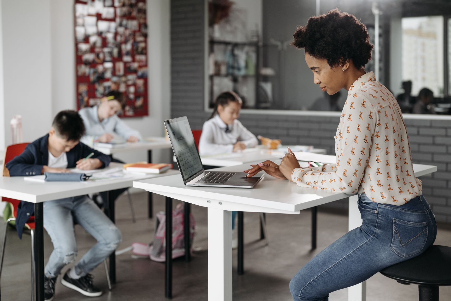Secondary school students using laptops for AI tutoring in UK schools