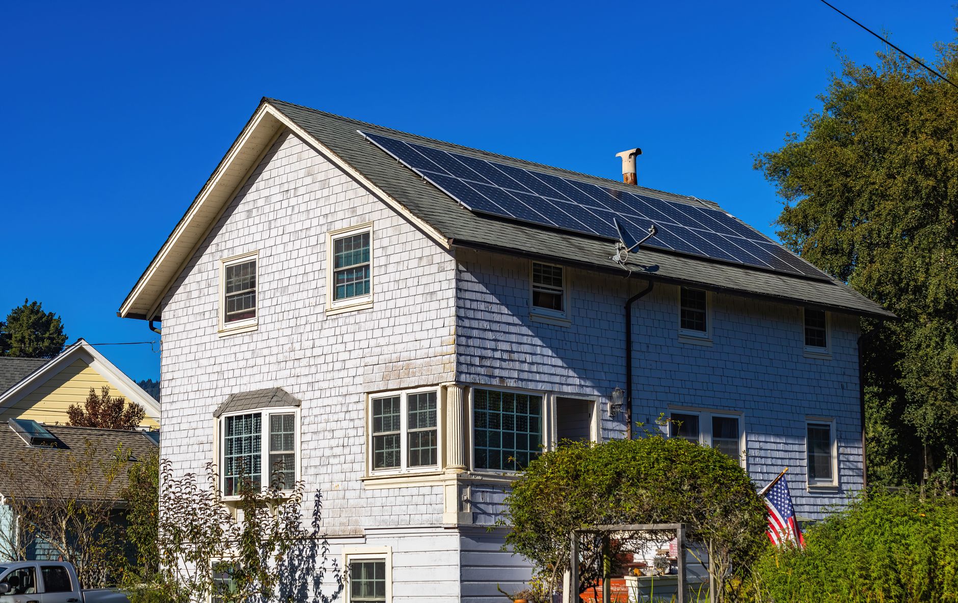 Solar panels installed on a residential roof as part of a home energy efficiency UK upgrade